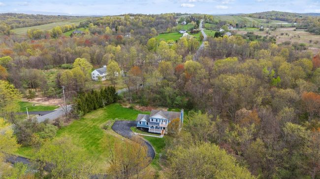 Bird's eye view featuring a forest view | Image 39