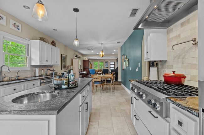 MAIN: View from kitchen toward living room | Image 11