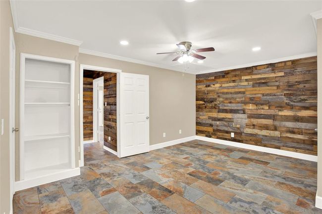 Coming off utility room you walk into the flex area. View from living room area of flex space looking back at utility room. | Image 32