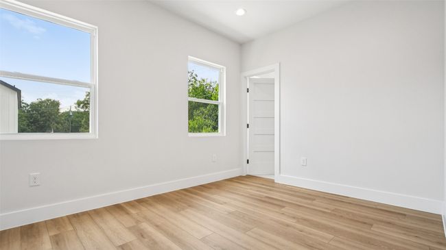 Unfurnished room with wood finished floors and recessed lighting | Image 18