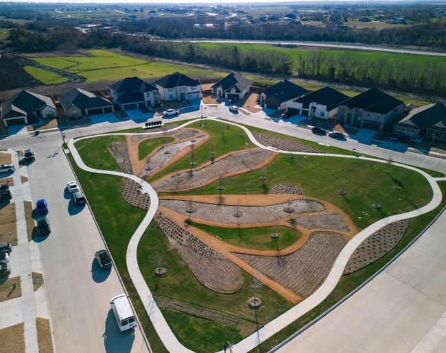 View of property location with nearby suburban area | Image 15