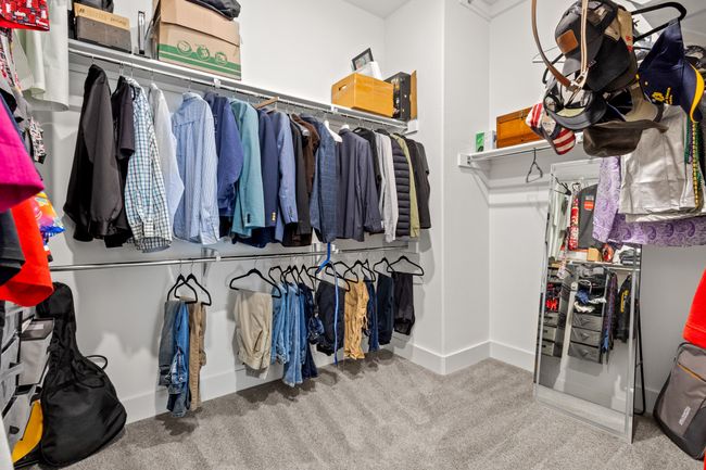 Spacious closet with carpet | Image 16