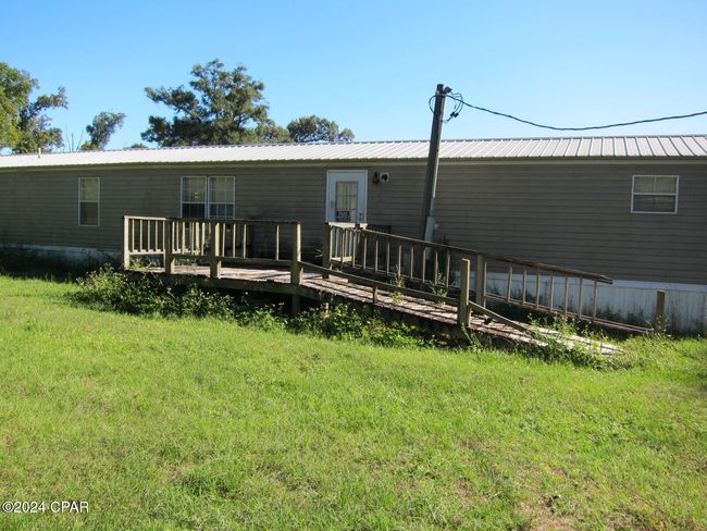6876 Brushey Pond Rd, House other with 2 bedrooms, 2 bathrooms and null parking in Grand Ridge FL | Image 6