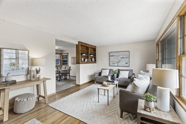 Original mid-century built-in shelving adds to the character of this charming home | Image 4