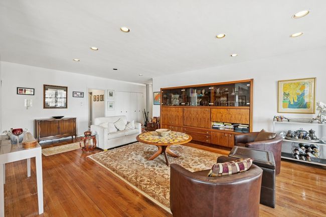 Living room featuring recessed lighting and light wood-style floors | Image 11