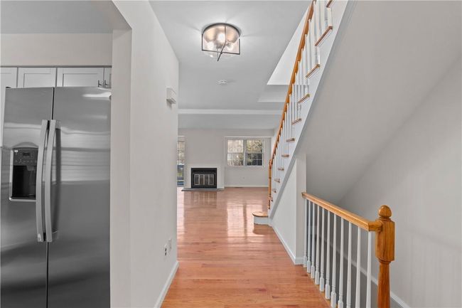 Walk through the hallway to the living room. | Image 4