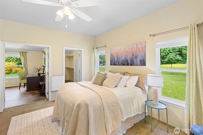 Primary bedroom with the bonus room and closet in the background. | Image 14