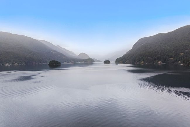 Water view with a mountainous background | Image 40