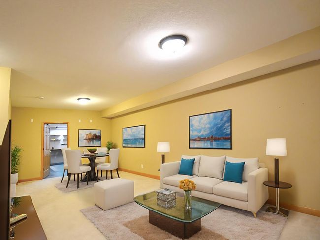 "Oversized lower-level great room for movies, games, and more. Virtually staged. | Image 6