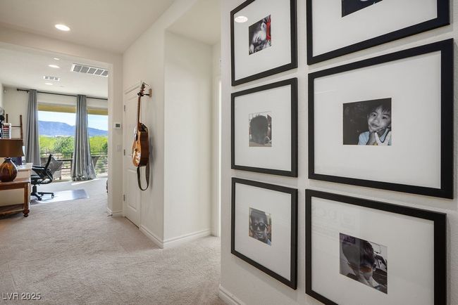 Hallway with baseboards, visible vents, carpet flooring, and recessed lighting | Image 30