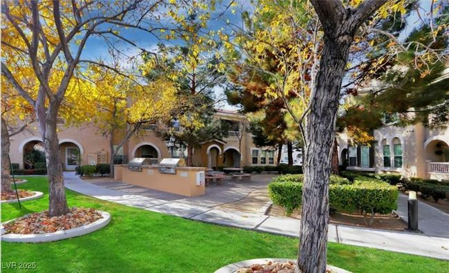 View of home's community featuring area for grilling and a yard | Image 5