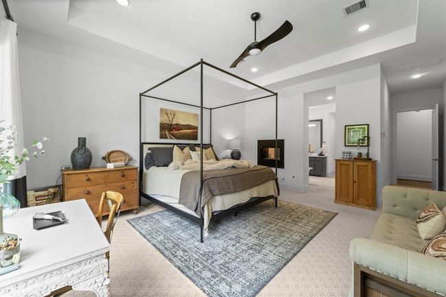 Double sided fireplace in the primary suite and bath | Image 28