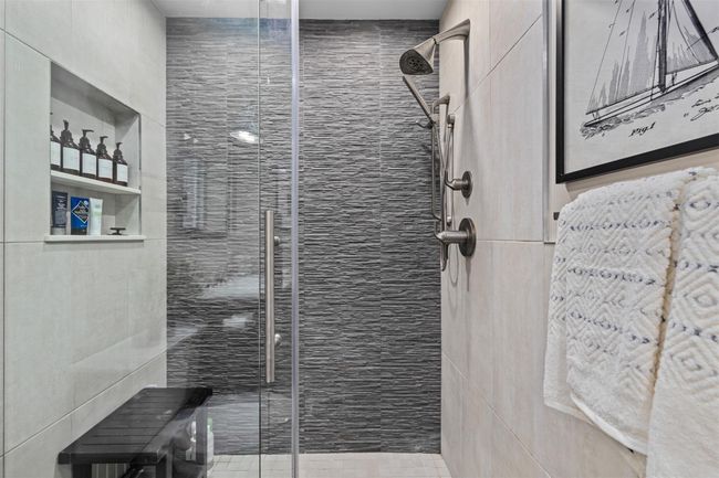 Full bathroom featuring a shower stall | Image 15