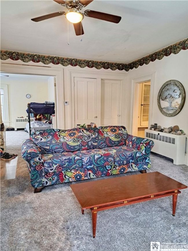 Lower Apartment - Living Room | Image 11