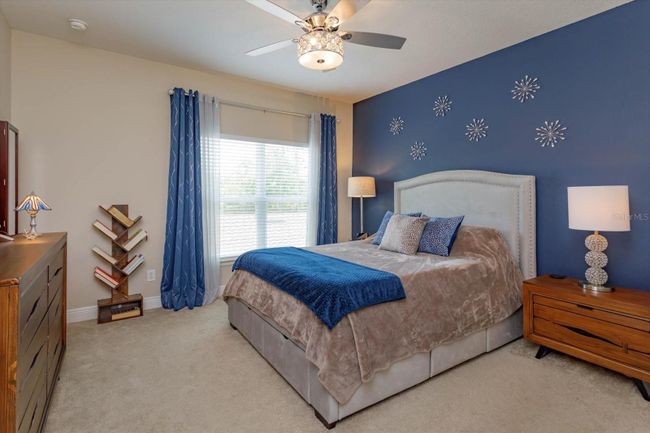 Upstairs Primary Bedroom with large walk in closet | Image 10