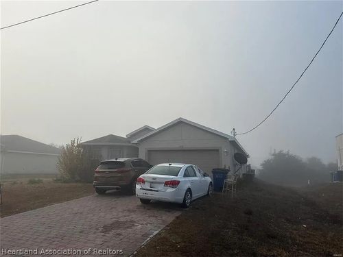 2913 65th St W, Lehigh Acres, FL, 33971-8209 | Card Image