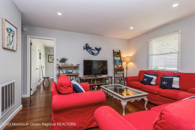 Seating Area with TV in Living Space | Image 5