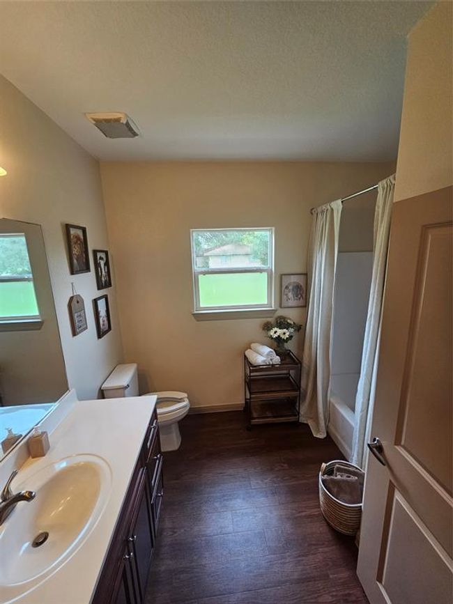 Full bathroom tub/shower combo with massive vanity | Image 10