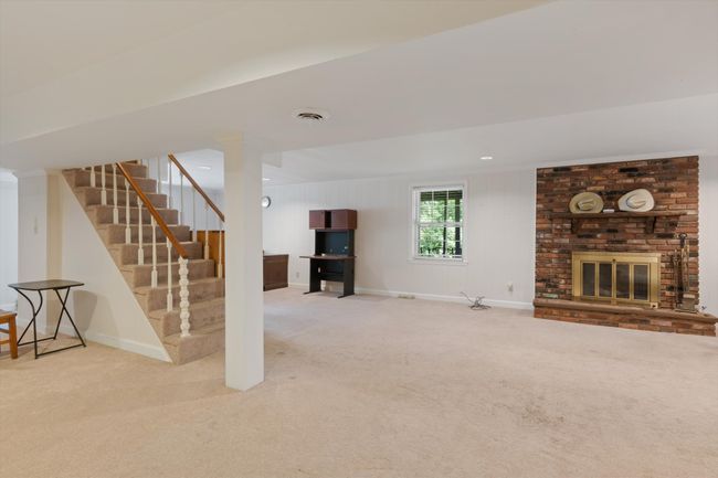Fully finished downstairs den, office space with separate entrance. | Image 27