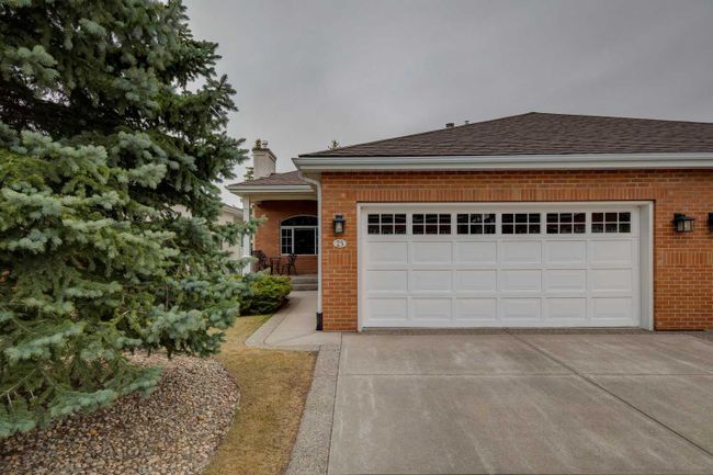 23 Prominence Point Sw, Home with 2 bedrooms, 2 bathrooms and 4 parking in Calgary AB | Image 1