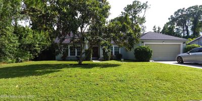 1422 Kaslo Circle Nw, House other with 4 bedrooms, 2 bathrooms and null parking in Palm Bay FL | Image 1