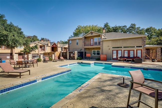 Community pool featuring a patio and french doors | Image 13