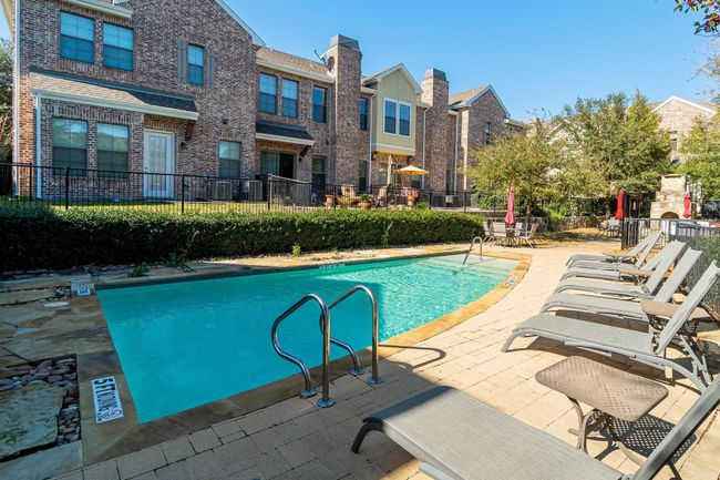Community pool with a residential view and a patio​​‌​​​​‌​​‌‌​‌‌​​​‌‌​​‌‌​‌​​​​​‌ area | Image 21