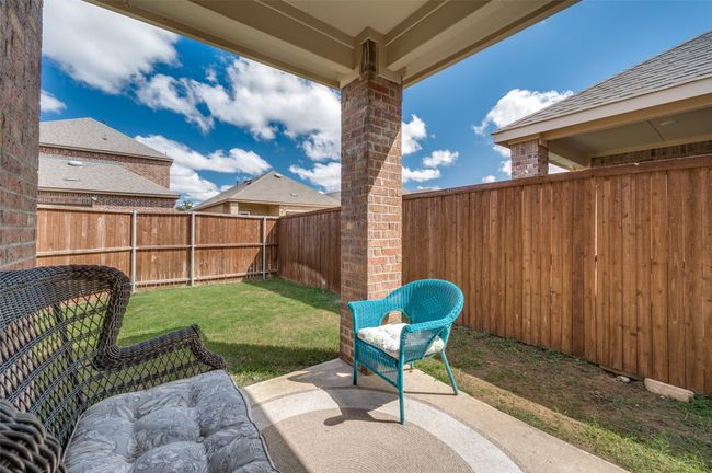 View of patio featuring a fenced backyard | Image 24