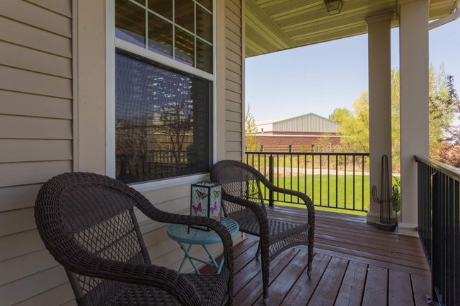 Covered wrap around front porch | Image 4