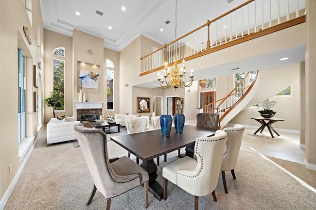 From dining area to the the living room, each space flows effortlessly into the next, allowing for both grand entertaining and intimate family gatherings. | Image 13