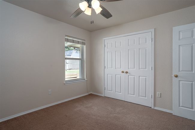 Bedroom featuring nice-sized closet | Image 31