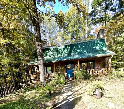 LAZY FRONT OF CABIN, LIFETIME METAL ROOF, APPX 2012 INSTALLED | Image 1