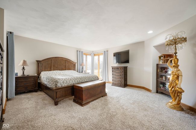 bedroom with recessed lighting, light colored carpet, and baseboards | Image 22