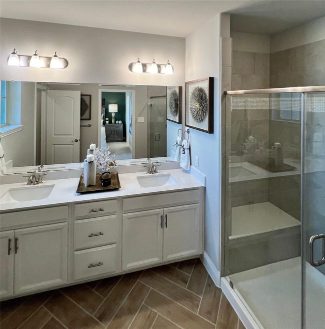 Ensuite bathroom with double vanity and a stall shower | Image 17