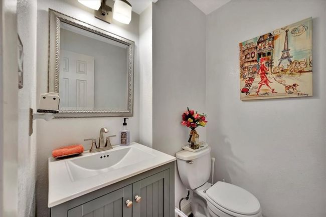Downstairs is a powder bath. | Image 24