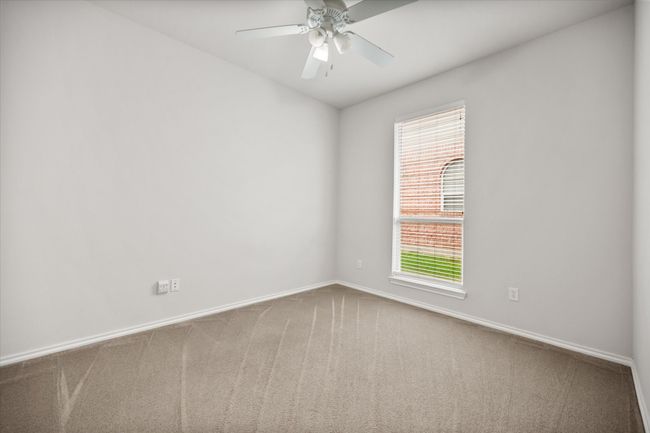 Empty room featuring carpet flooring and a ceiling fan | Image 19