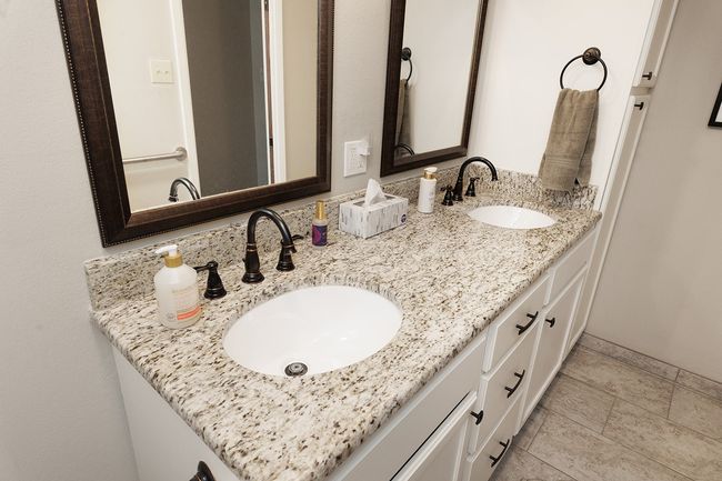 Bathroom with a sink and double vanity | Image 23
