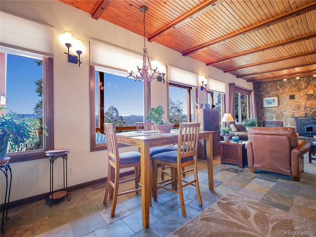 High Wood Plank Ceiling in Dining and Great Room | Image 8