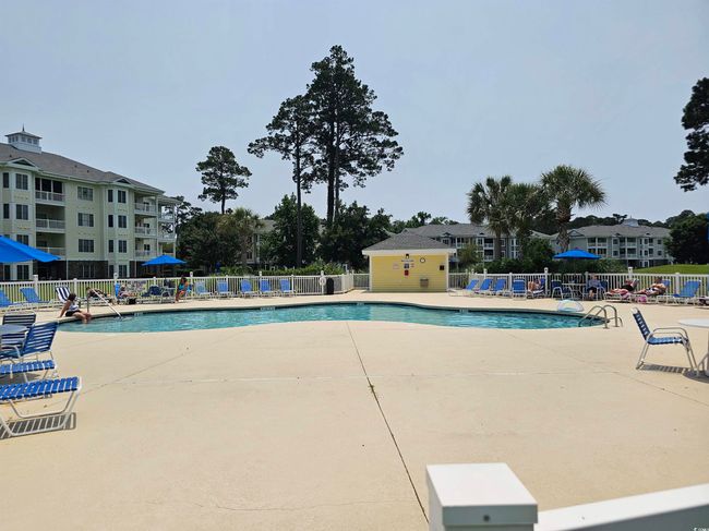 Community pool featuring a patio area | Image 19