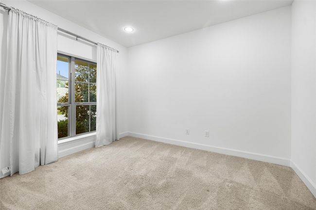 Bright, cozy office with a large window | Image 5