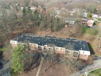 Here we have an aerial view of the building. Unit 12 is on the back far left first floor-a peaceful end unit! | Image 2