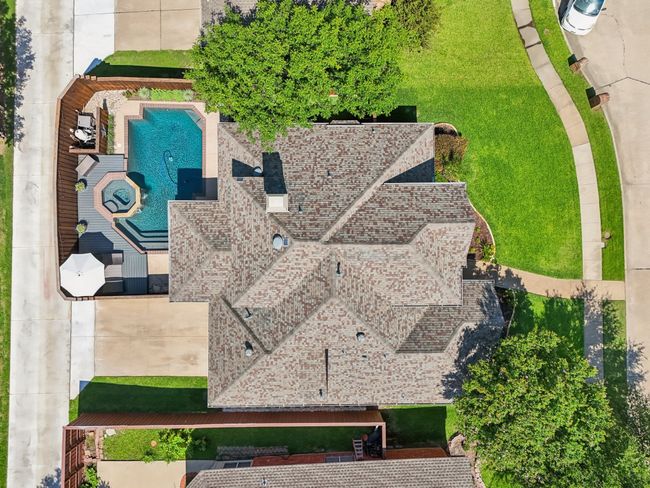 Aerial view of property and surrounding area with a pool | Image 33