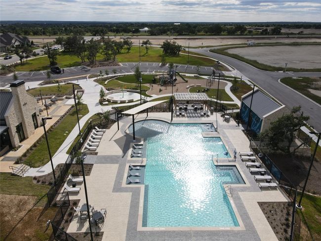 Community pool with a patio | Image 30