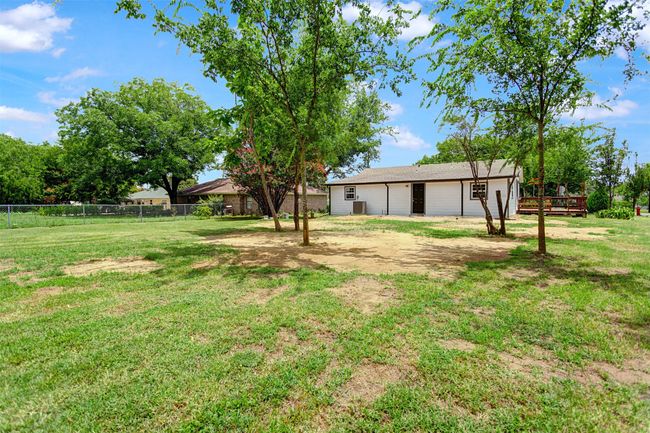 View of spacious back yard | Image 14