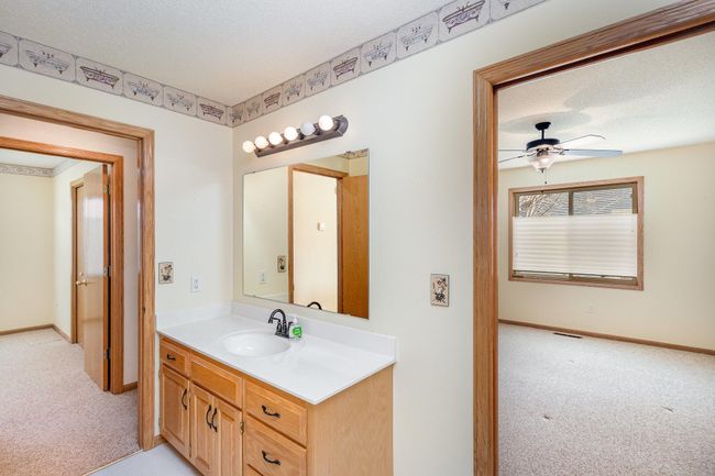 Walk-through bath has separate shower & tub. | Image 15