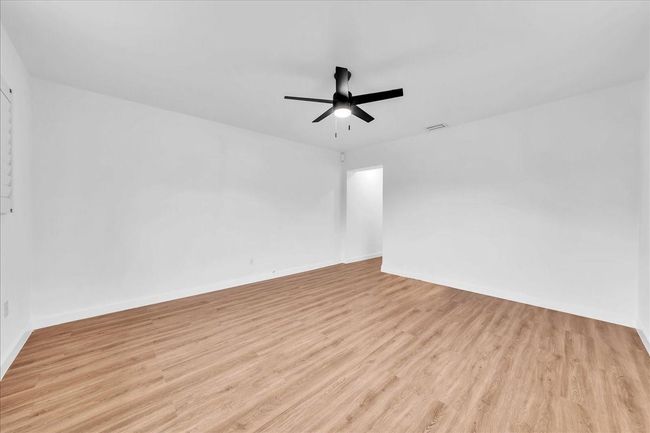 with Walk-in Closet, Plantation Shutters & New Ceiling Fan | Image 23