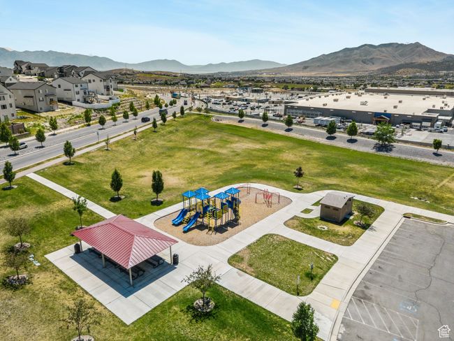Drone / aerial view of a mountainous background and a community park | Image 37