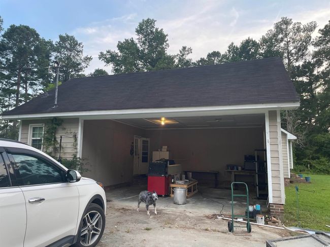 View of home's exterior with a carport | Image 37