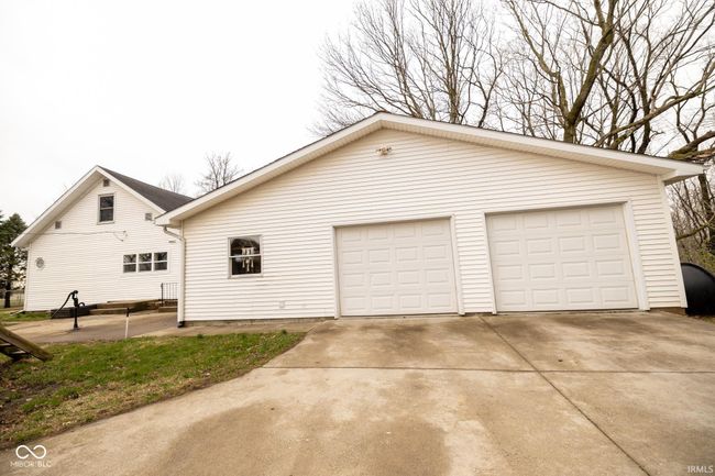 exterior space with a garage | Image 16
