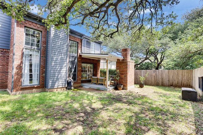 View of yard with a patio and cooling unit | Image 32
